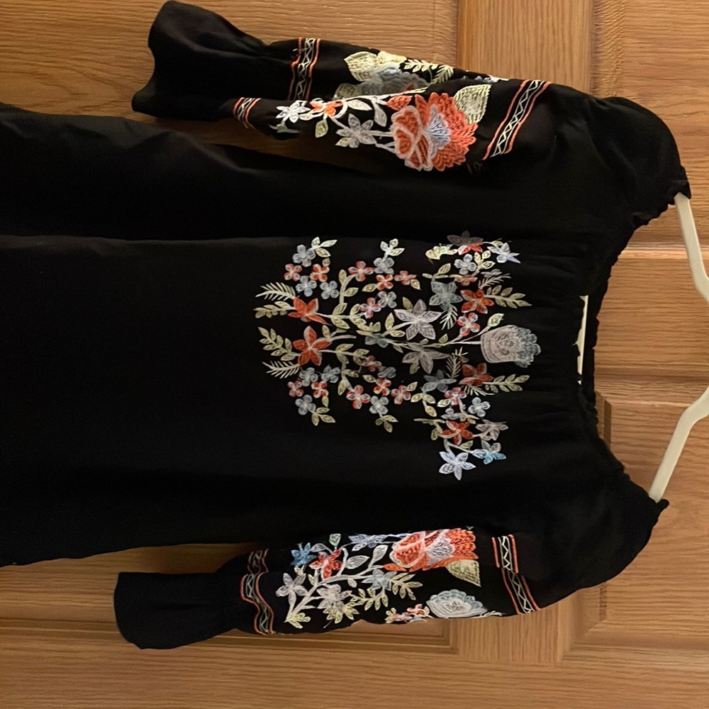 This is a free people top absolutely beautiful, jeans or leggings!